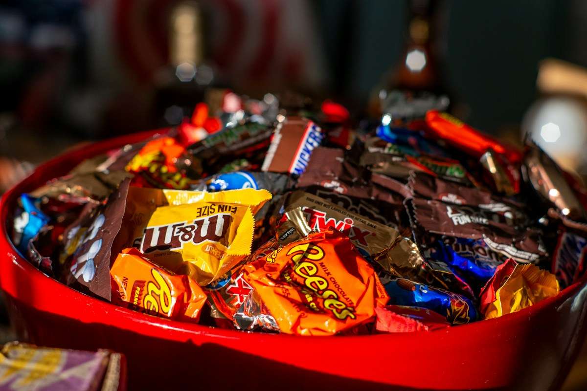 Bowl of Halloween candy on a kitchen counter out of reach of a curious dog in an Elk Grove home